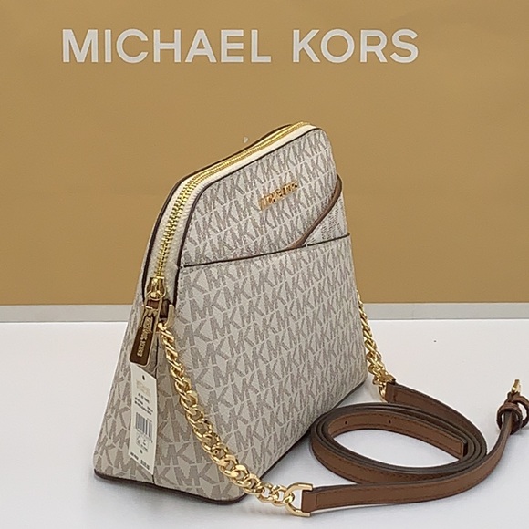 Michael Kors Medium Dome Xcross Xbody Bag
Color: Vanilla Multi - Picture 5 of 16
